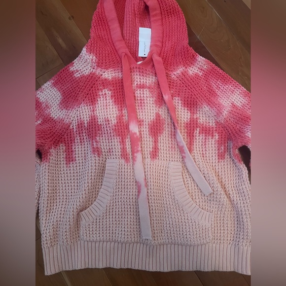 A cropped hooded sweater, new with tags on it. Comfy and cute! - Picture 2 of 3